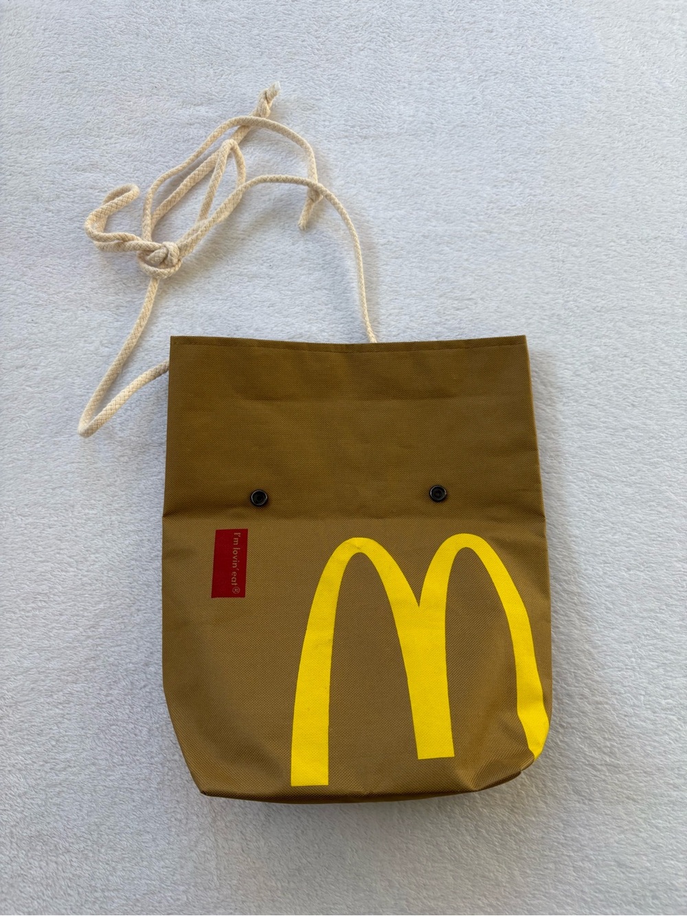 Brown Canvas Belt Bag with Yellow Logo and Cream Rope Strap